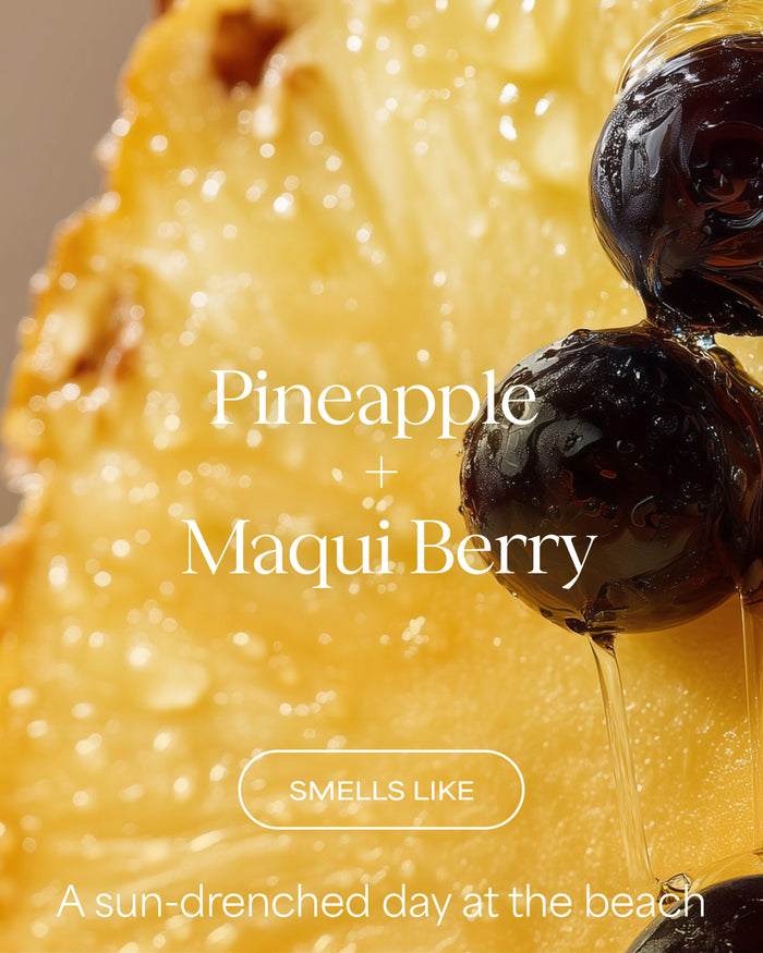 Close-up of pineapple and maqui berry with text describing their scent for Raw Sugar Body Wash designed to help gently cleanse and hydrate skin with clean ingredients.