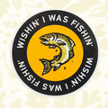 Forager Provisions LTD round vinyl sticker featuring a jumping fish and the text Wishin I Was Fishin on a yellow background